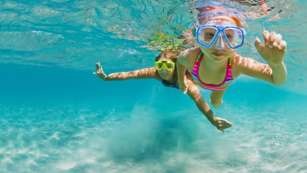 sisters snorkeling on the Gulf of Florida