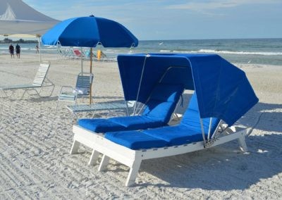 lounge chairs on the sand