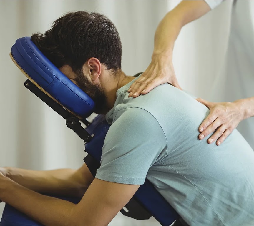 man in a massage chair