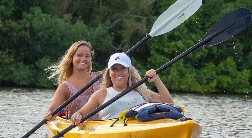 women paddling in a kayak