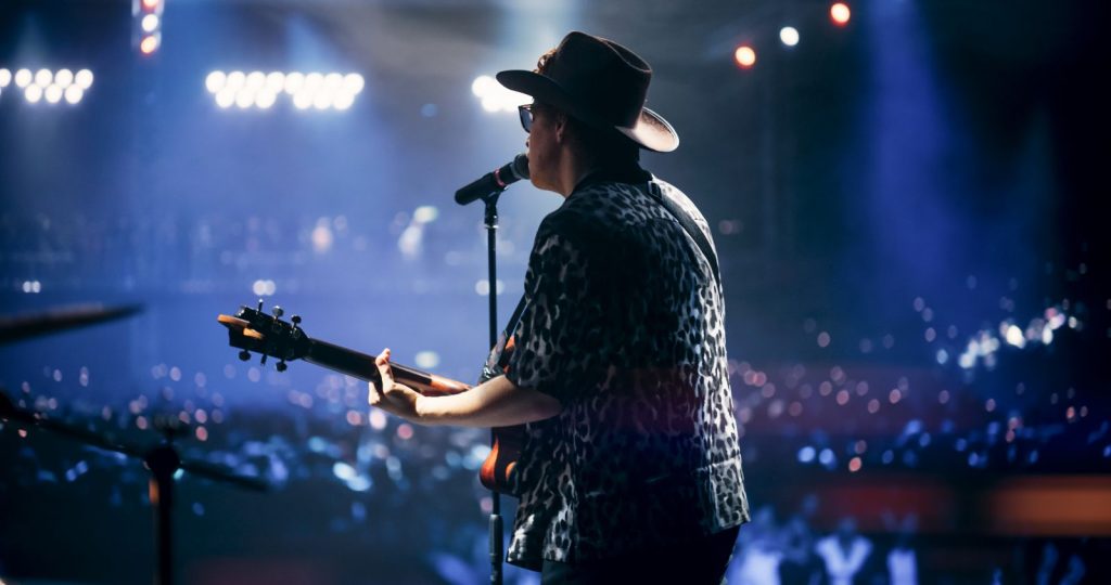 man performing at country music festival